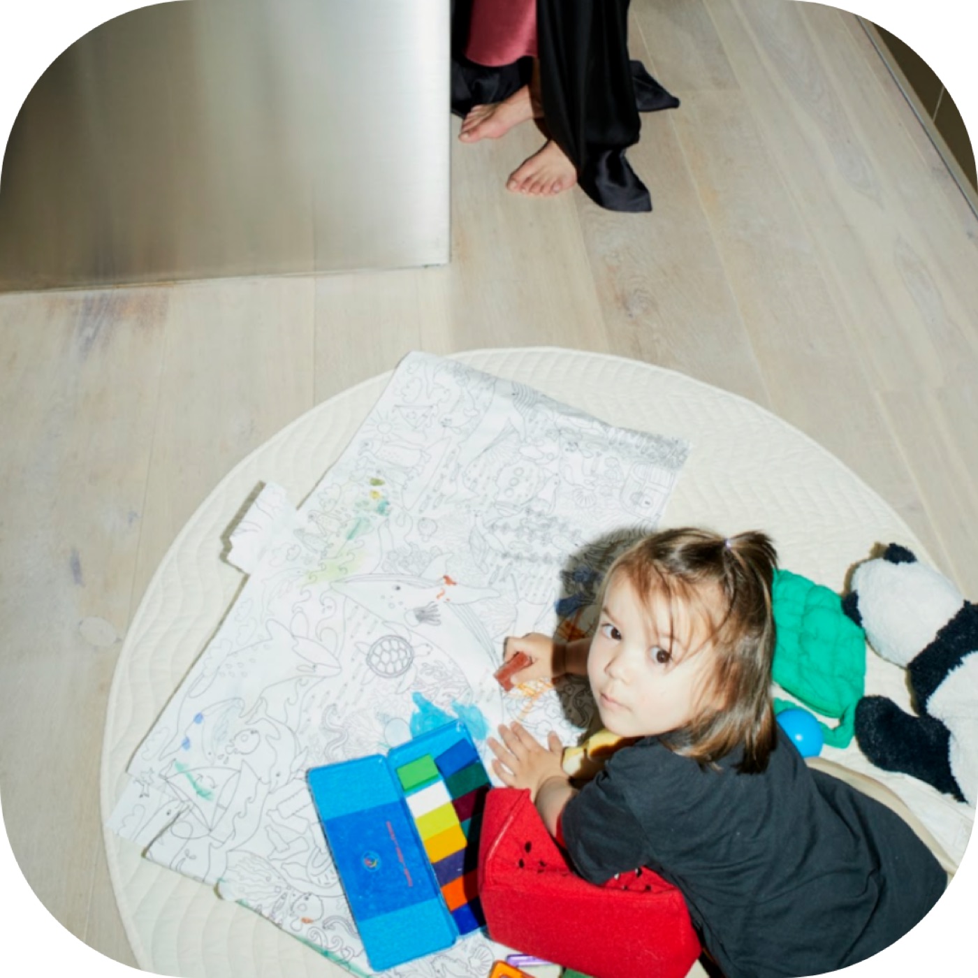 A child during a play therapy session in Los Angeles, learning improved emotional expression. 