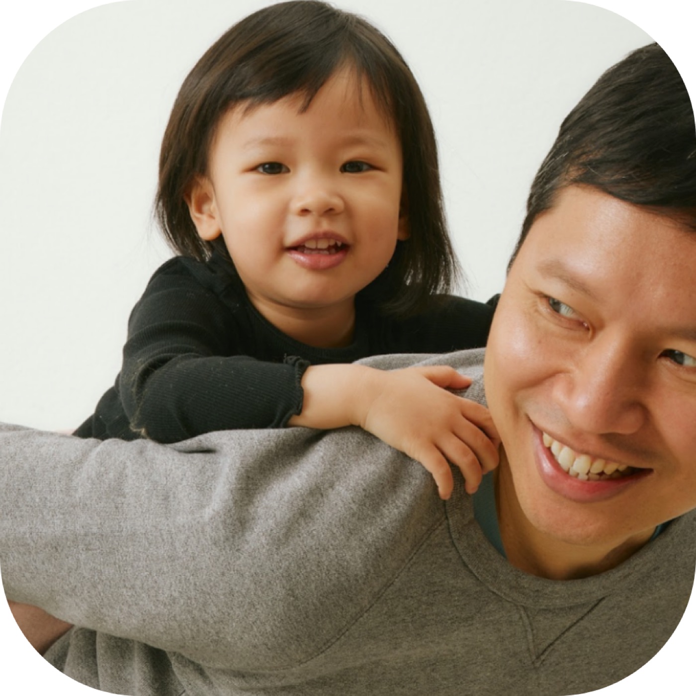 A father takes his child to a play therapy center in los angeles.