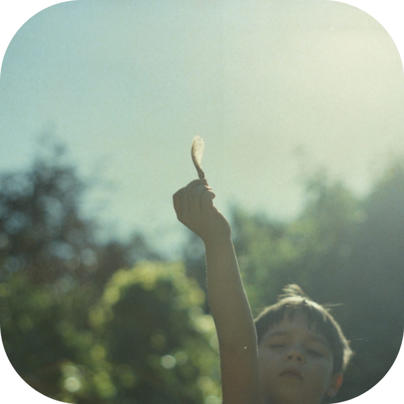 A child calms his mind outside with tactics he learned at Child Therapy Center LA to help with his ADHD.